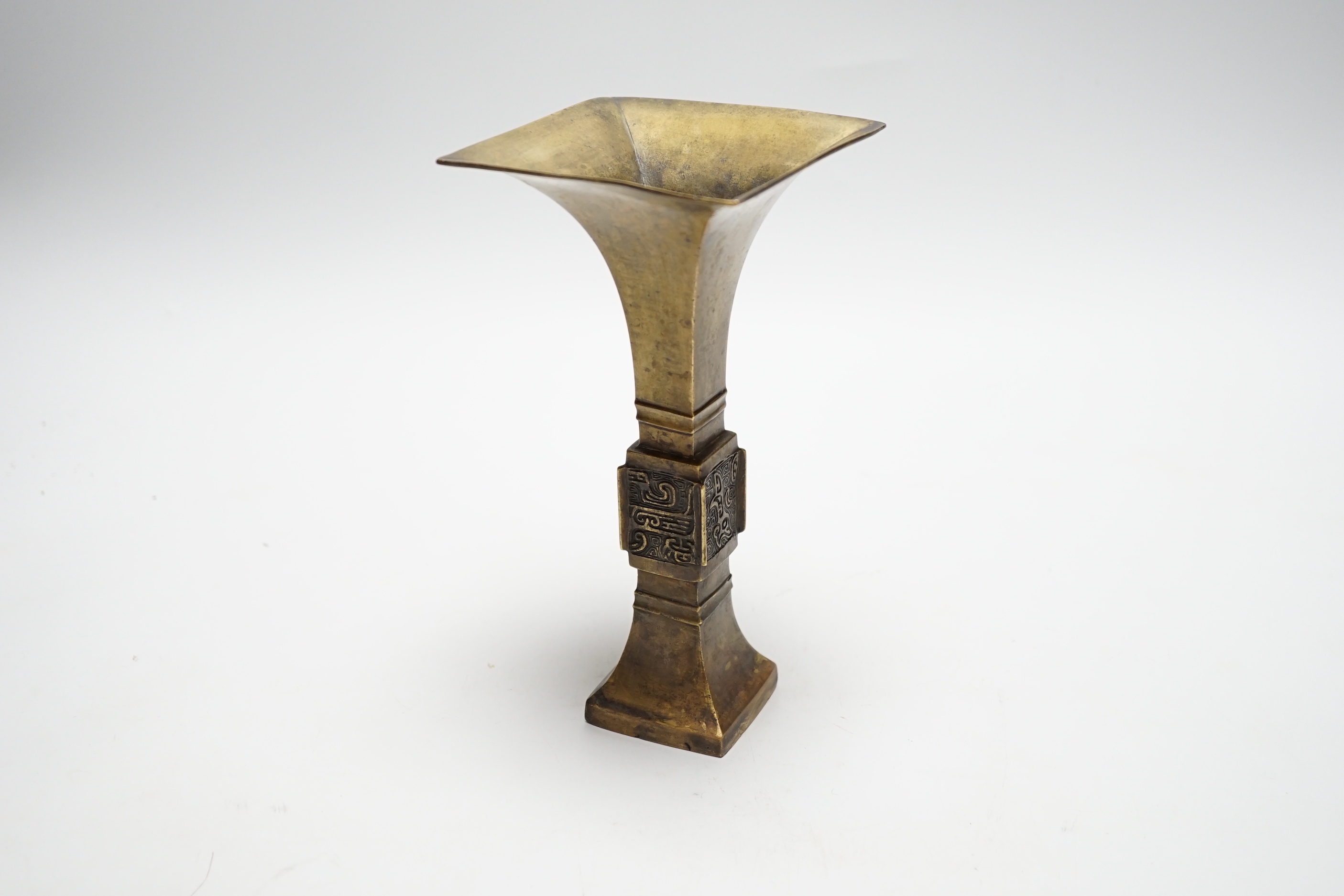 An 18th/19th century Chinese archaistic bronze fanggu vase, 20cm